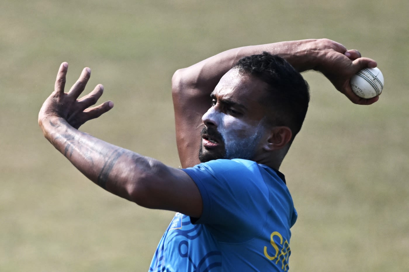 Chamika Karunaratne bowls in the nets