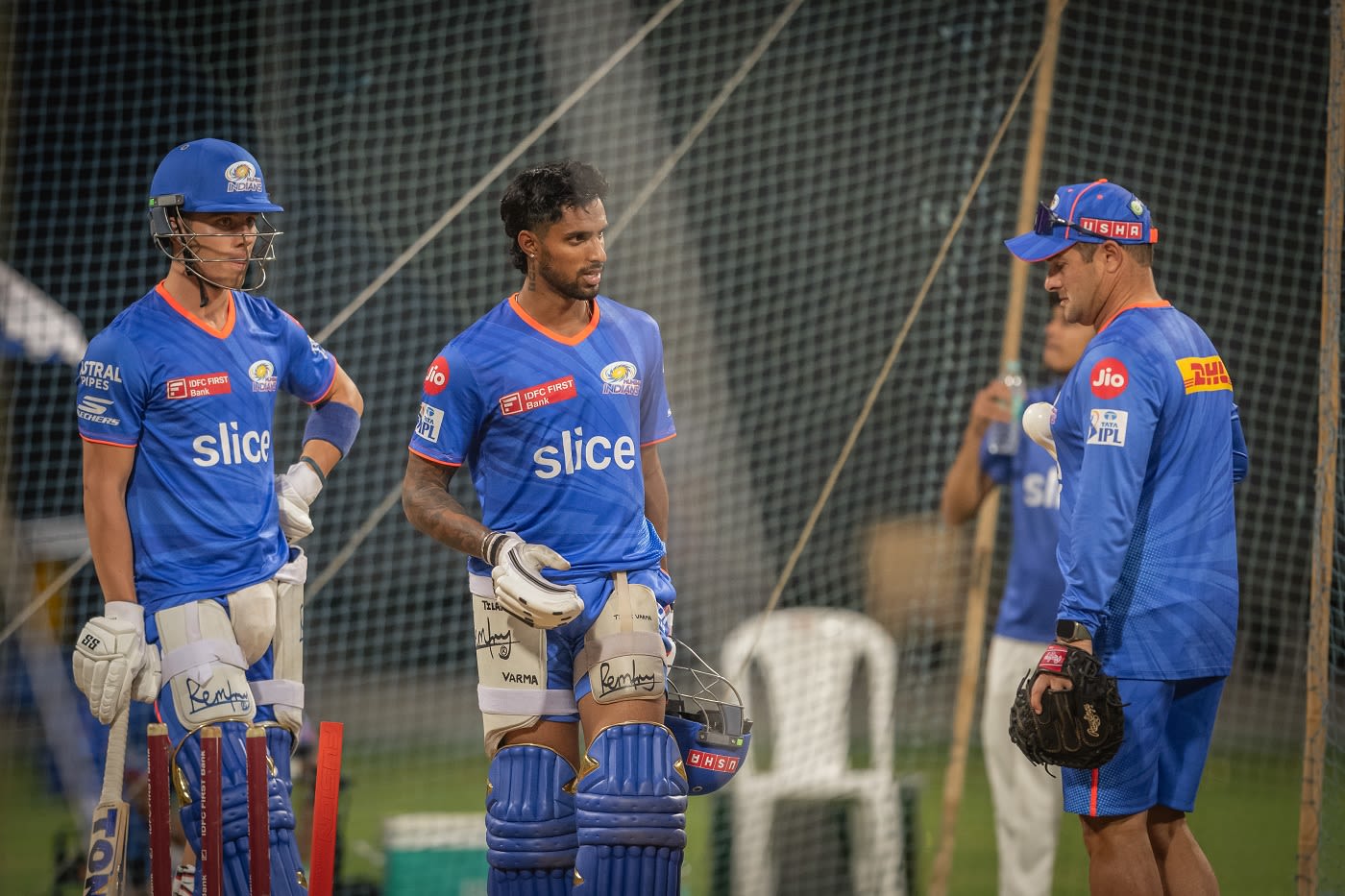 Dewald Brevis and Tilak Varma have a chat with Mark Boucher