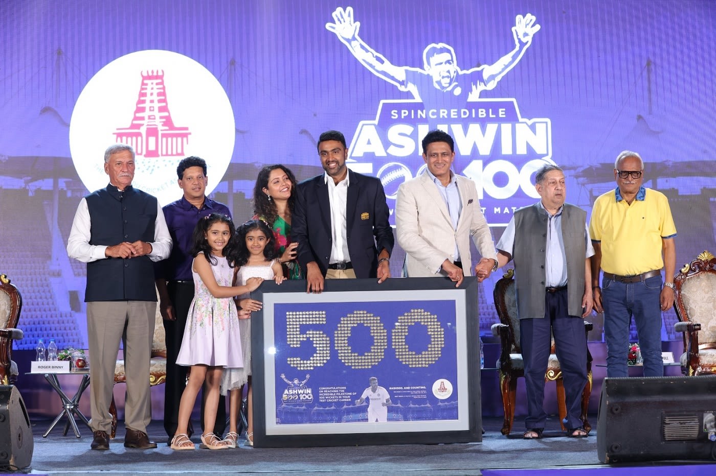 R Ashwin with his family, BCCI president Roger Binny, Anil Kumble, N Srinivasan and Kasi Viswanathan at an event
