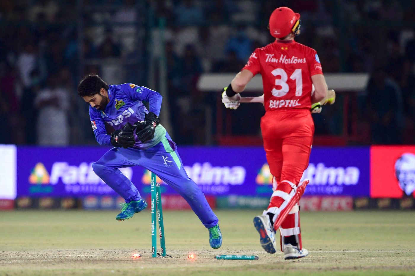 Martin Guptill was run out for 50 in a blow to United's run-chase