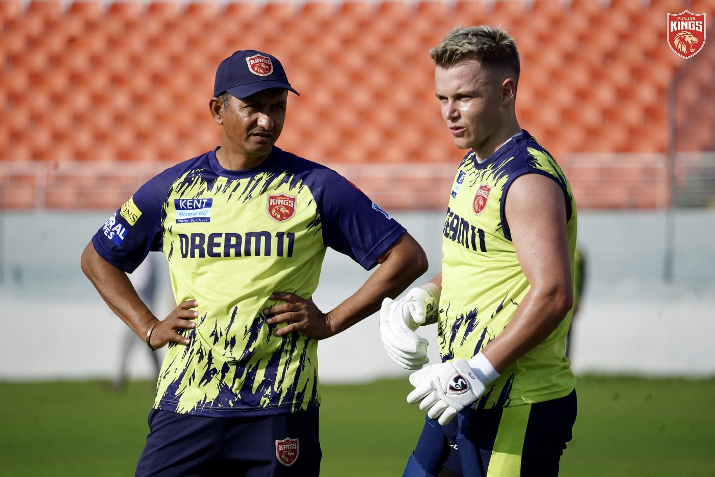Sanjay Bangar, head of cricket at Punjab Kings, chats with Sam Curran