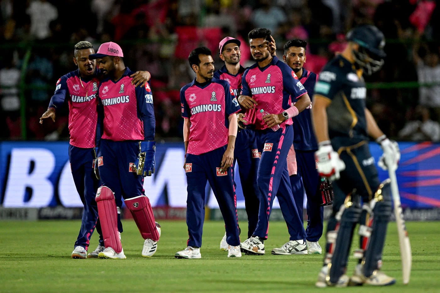 Kuldeep Sen celebrates with his team-mates after dismissing Abhinav Manohar