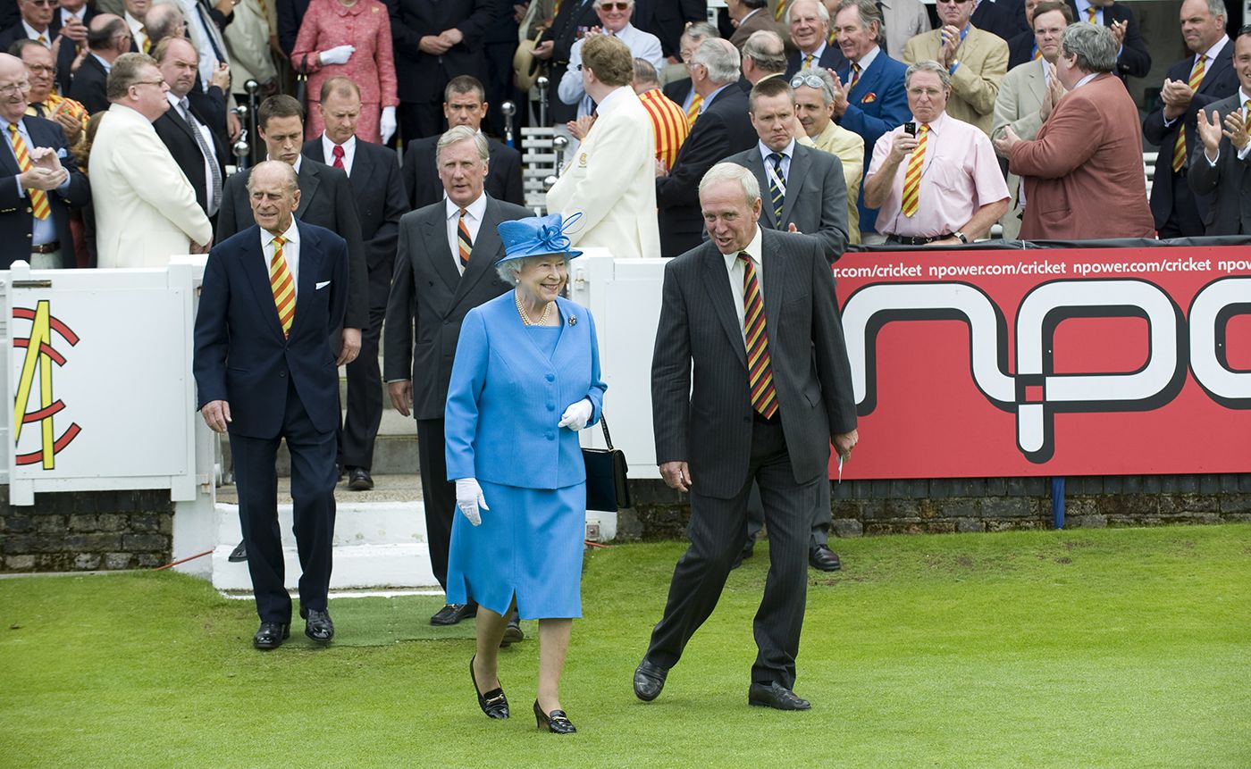 Queen Elizabeth II is led onto the field by MCC president, Derek Underwood