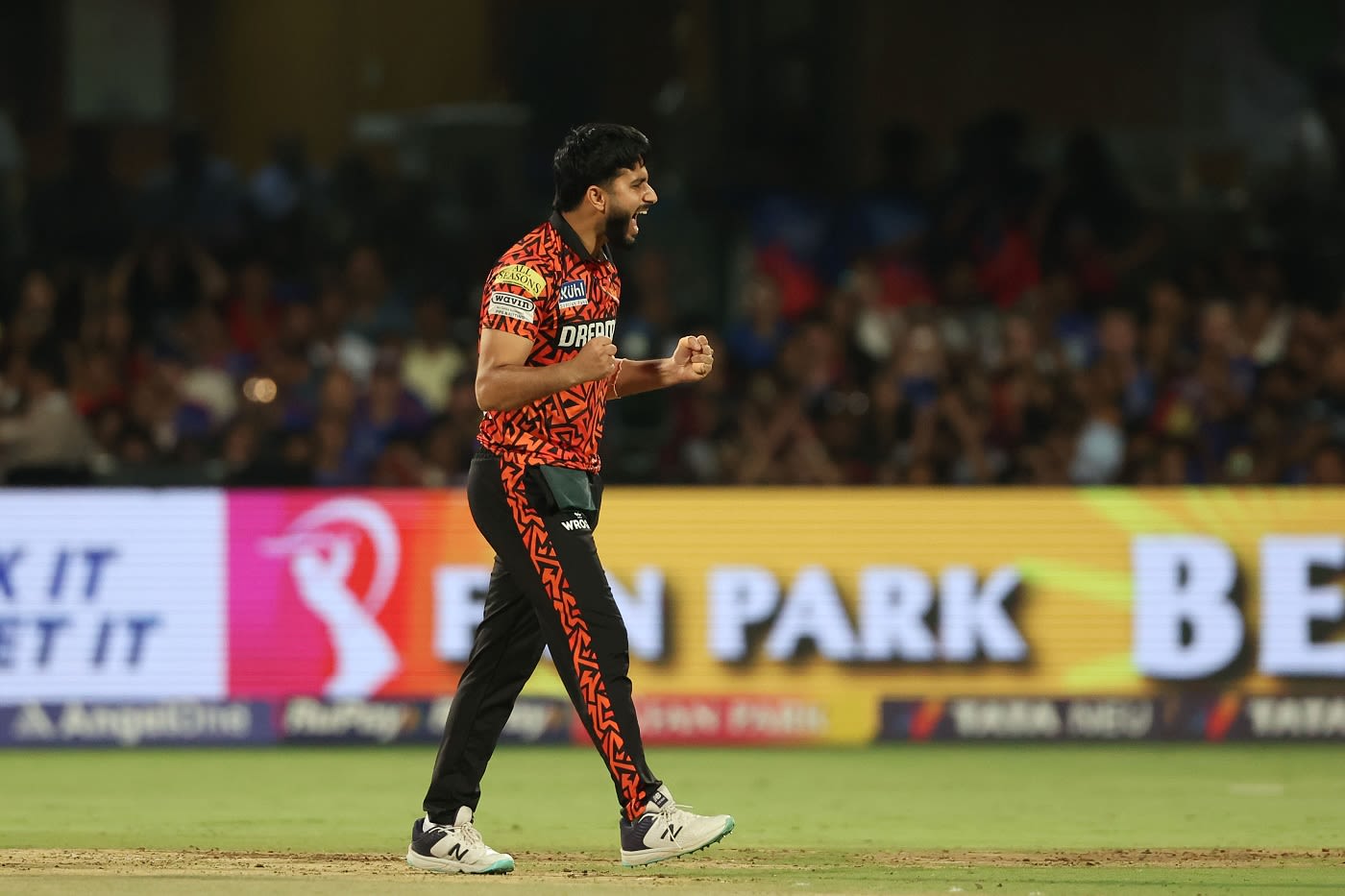 Mayank Markande celebrates the dismissal of Virat Kohli