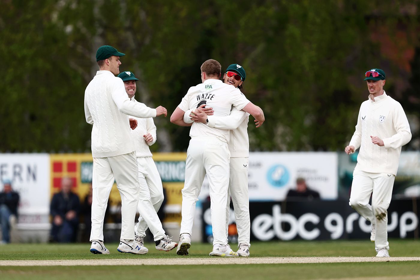 Matt Waite celebrates a breakthrough with his team-mates