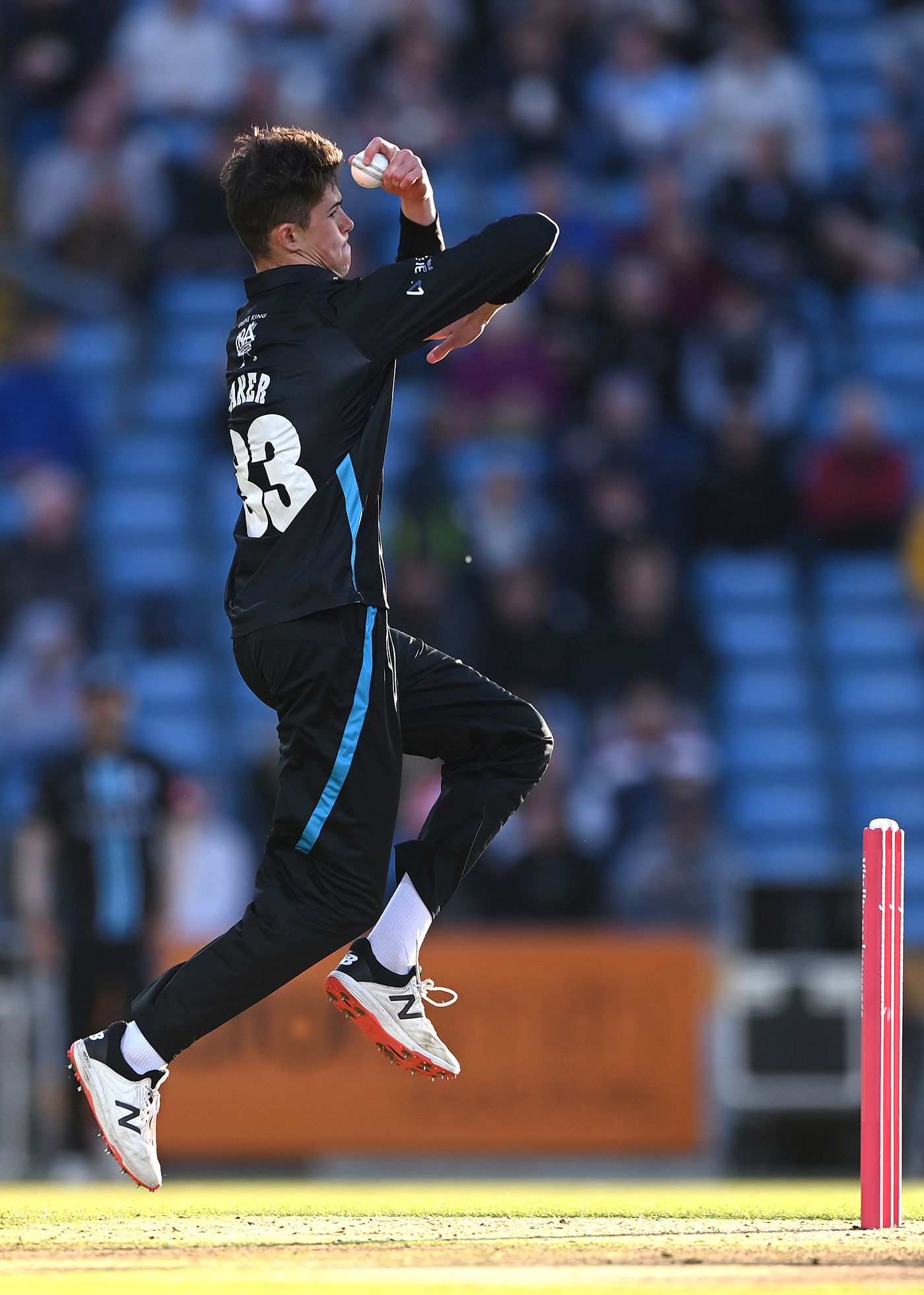 Josh Baker in his bowling action
