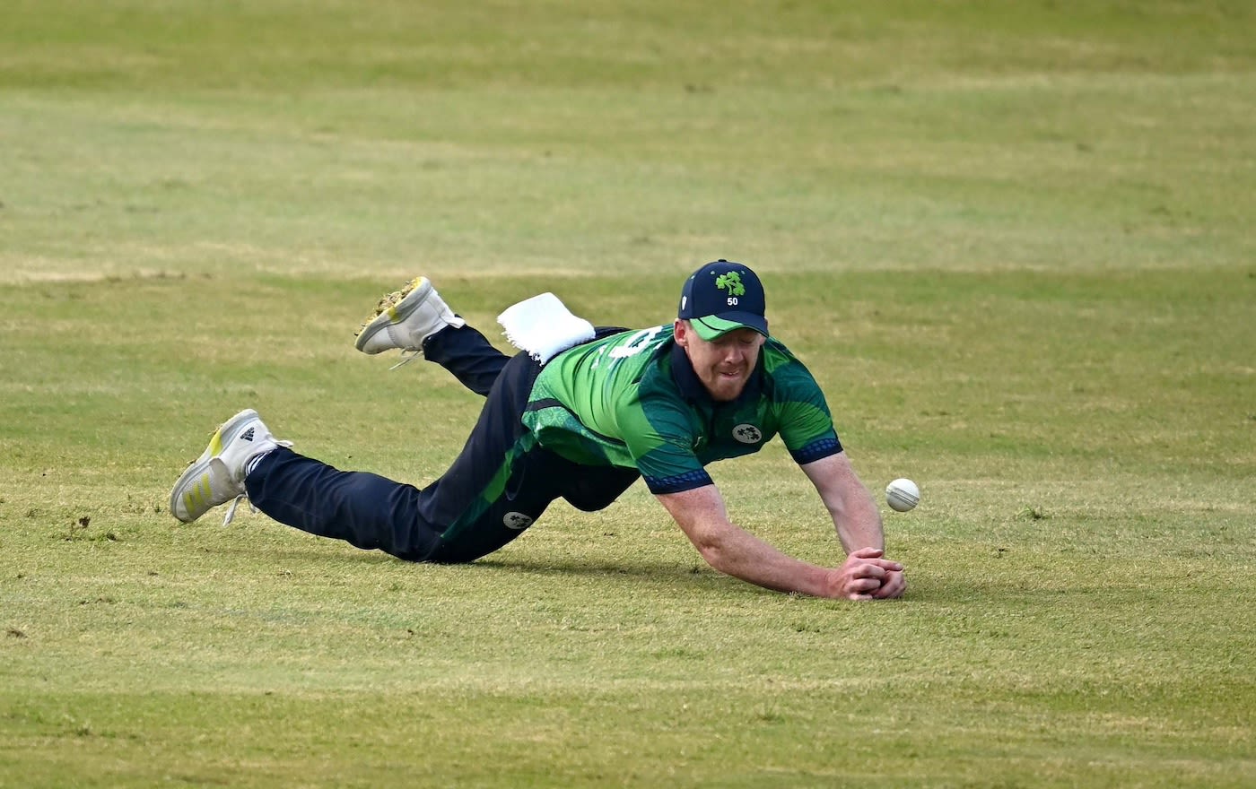Craig Young dives in the field