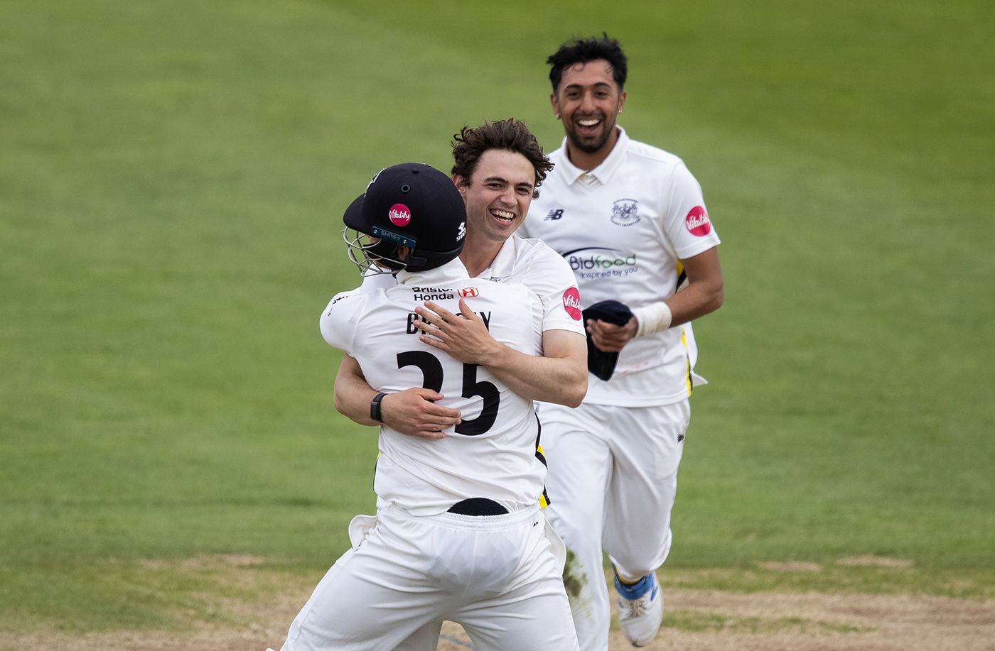Tom Price gets a hug from James Bracey