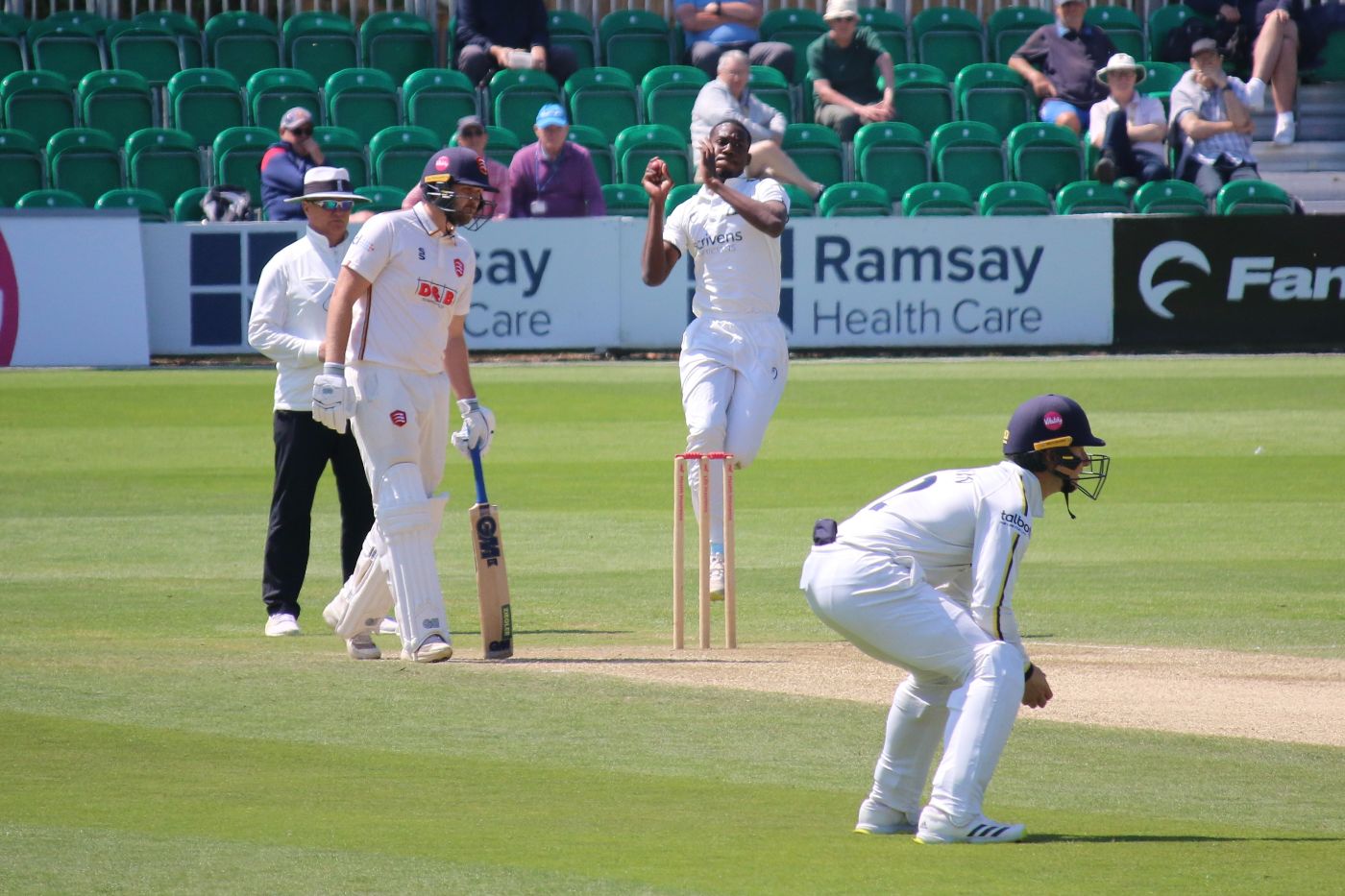 Che Simmons bowls during his first-class debut