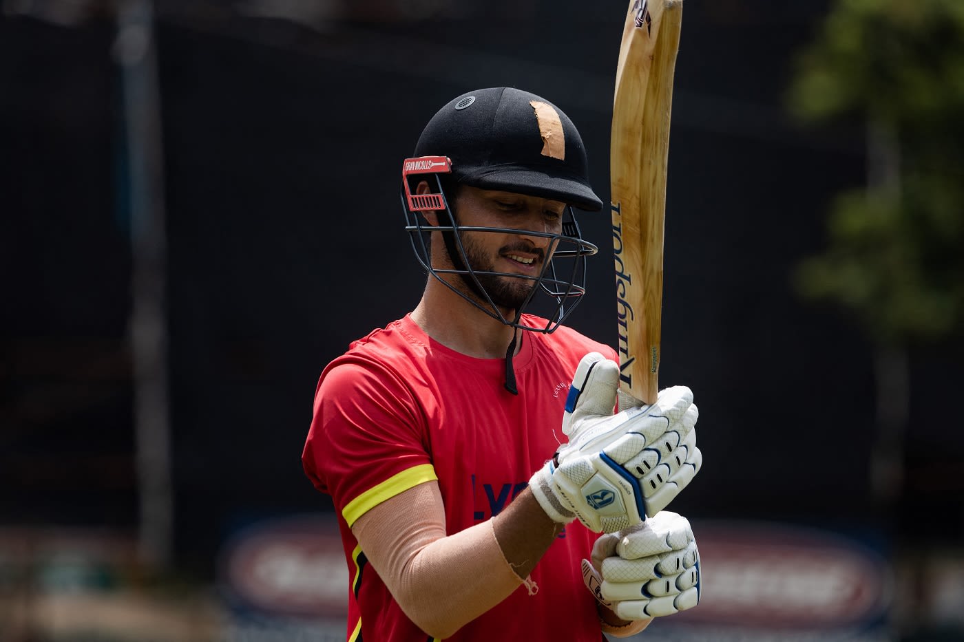 Uganda batter Riazat Ali Shah gets ready for a batting session