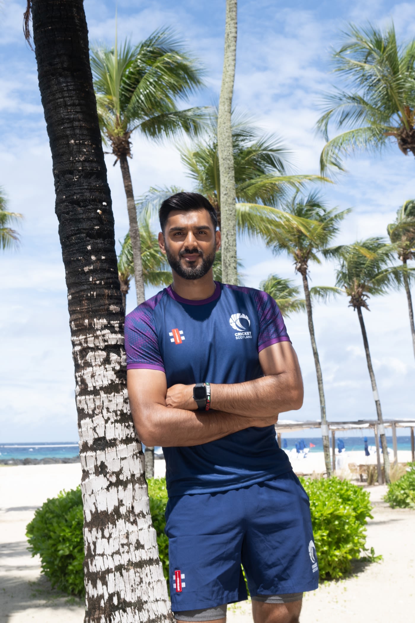 Safyaan Sharif strikes a pose during a team photo session