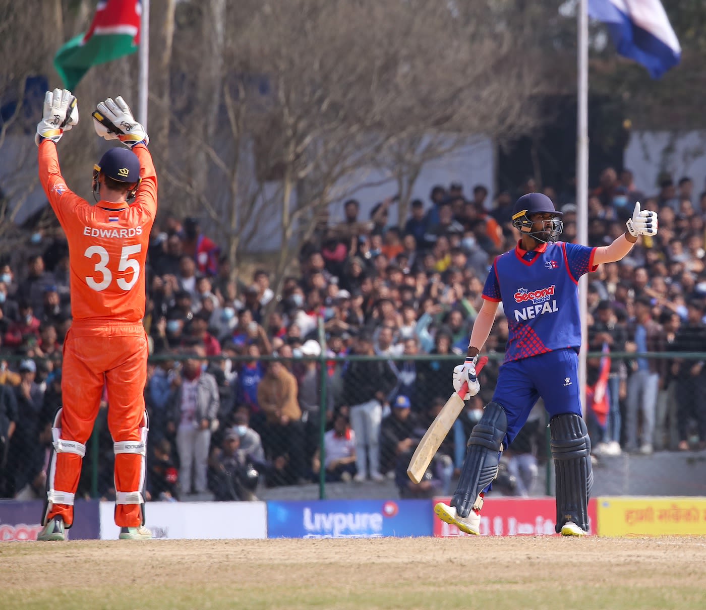 Anil Kumar Sah signals to his partner