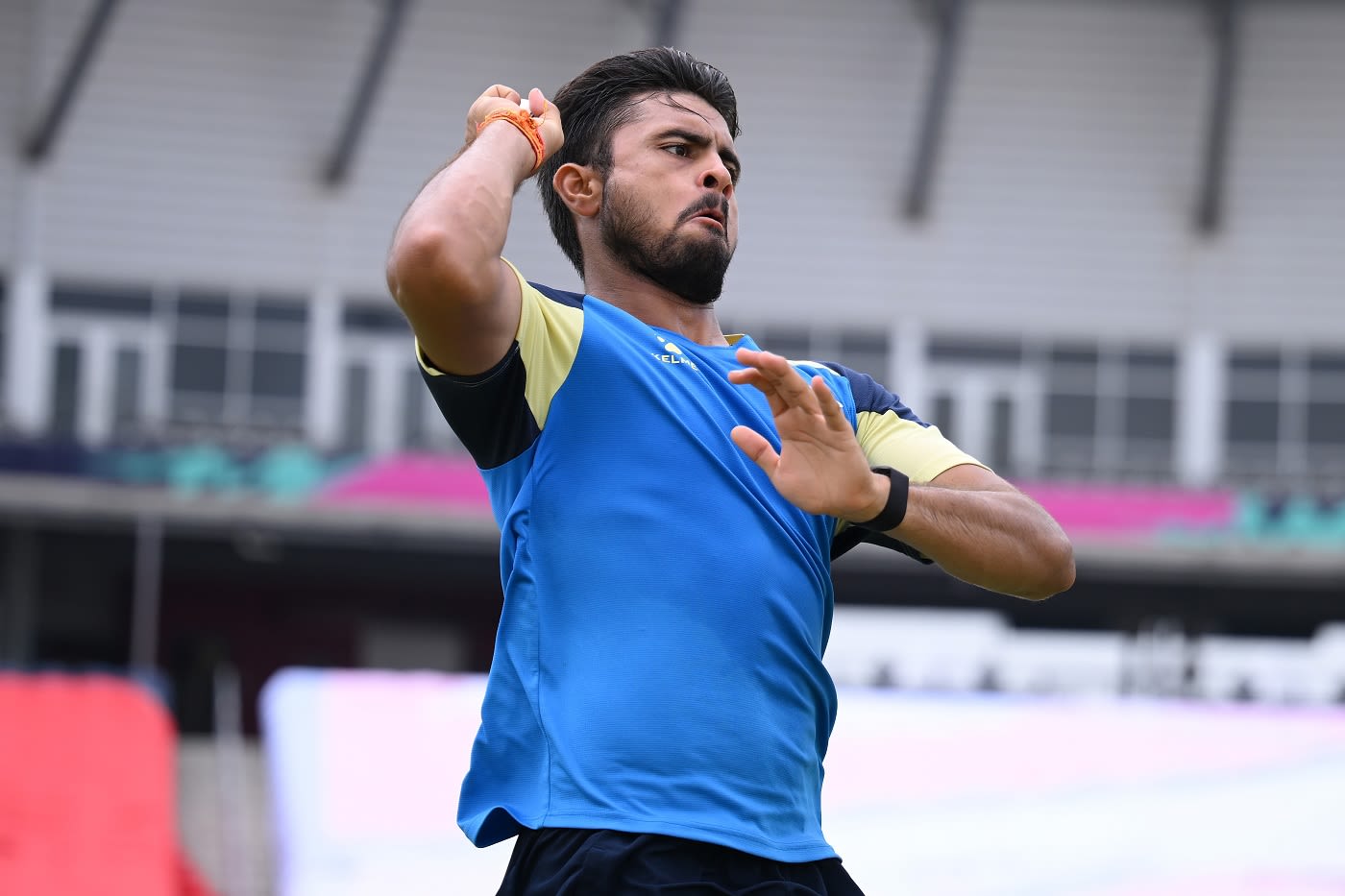 Gulsan Jha bowls during a practice session
