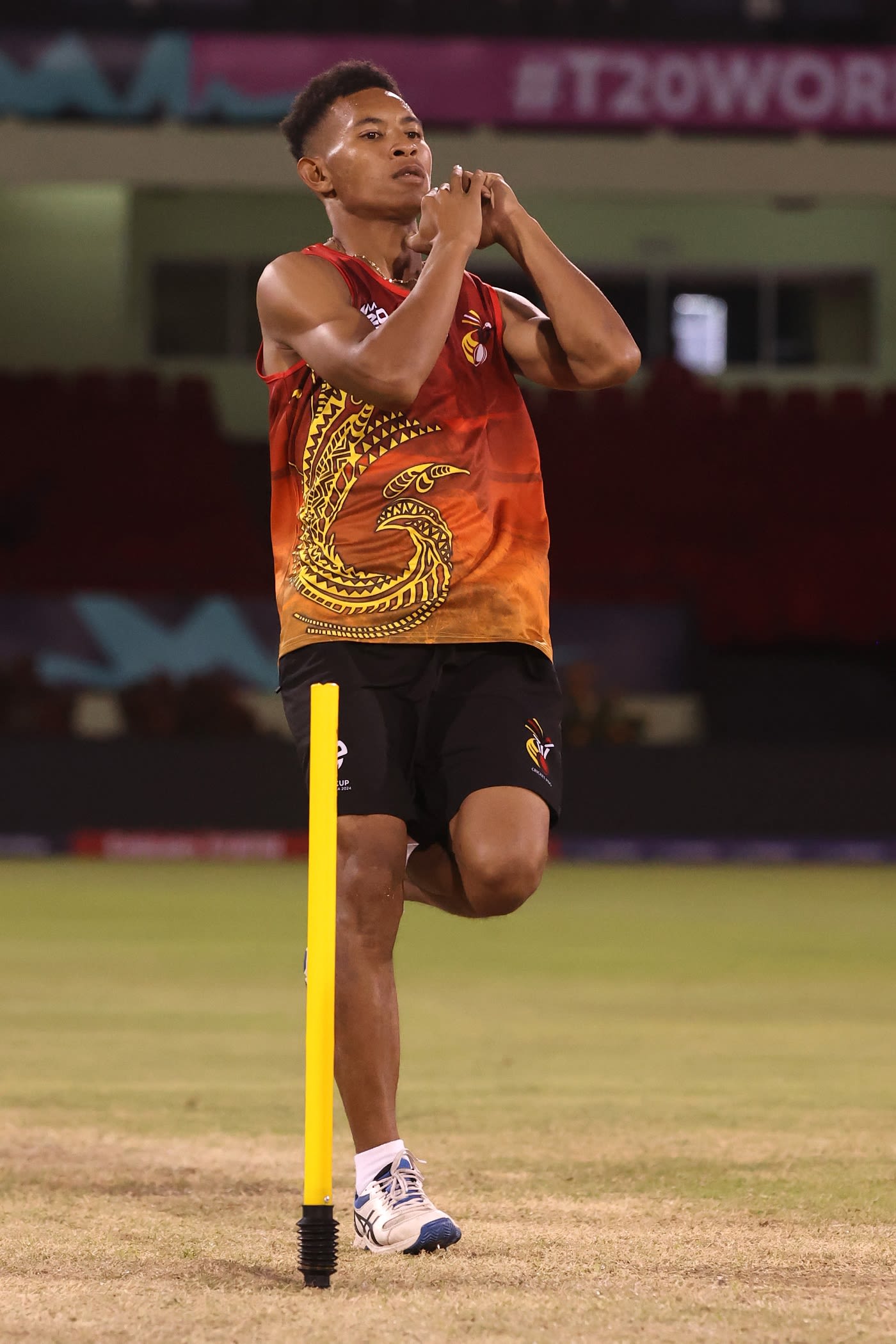 Left-arm spinner John Kariko in his delivery stride at a practice session
