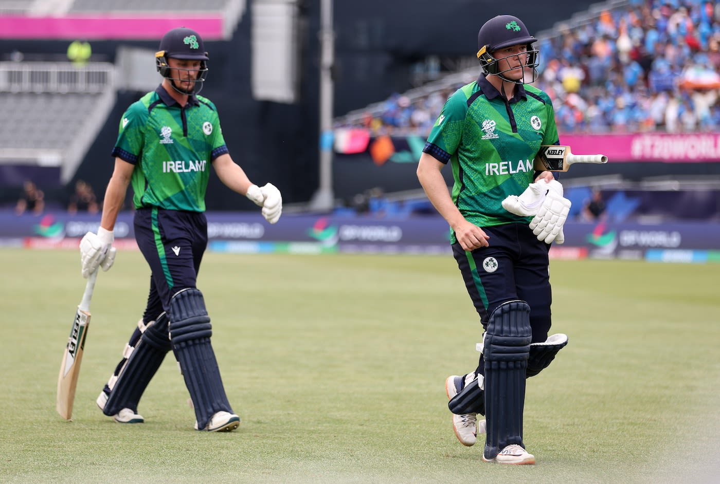 Gareth Delany and Ben White walk off after Ireland were dismissed for 96