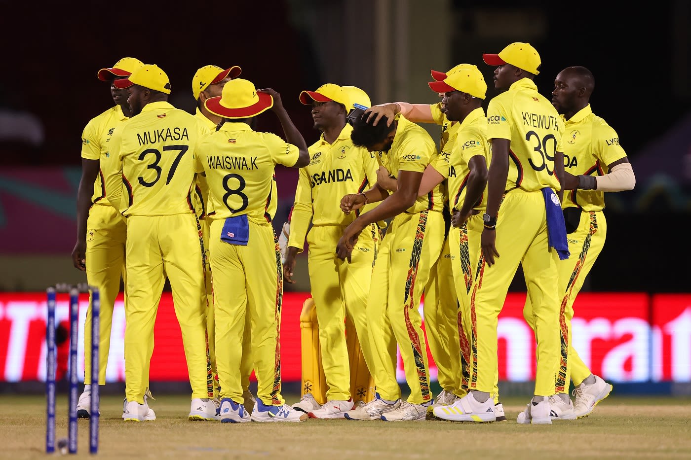 Uganda players celebrate an early wicket
