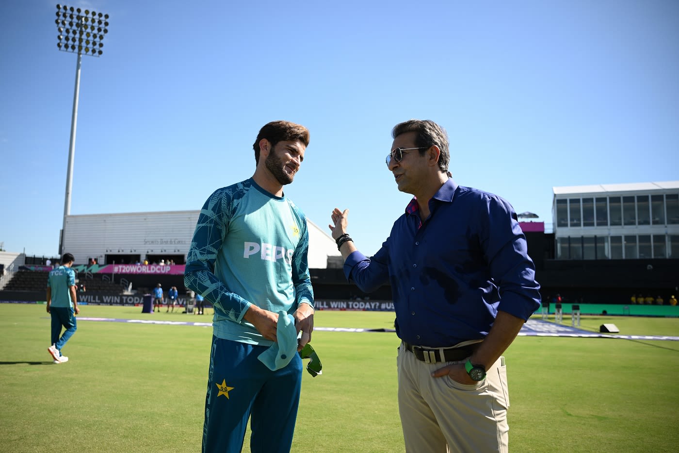 Shaheen Shah Afridi and Wasim Akram have a chat on the sidelines of the game