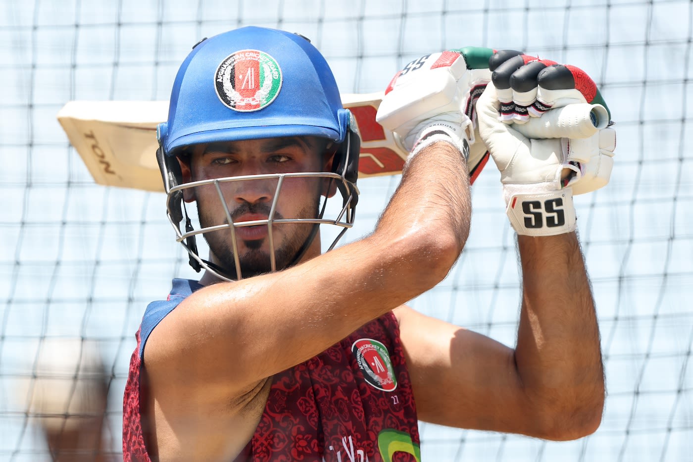 Mohammad Ishaq bats in the nets ahead of Afghanistan's T20 World Cup game against New Zealand