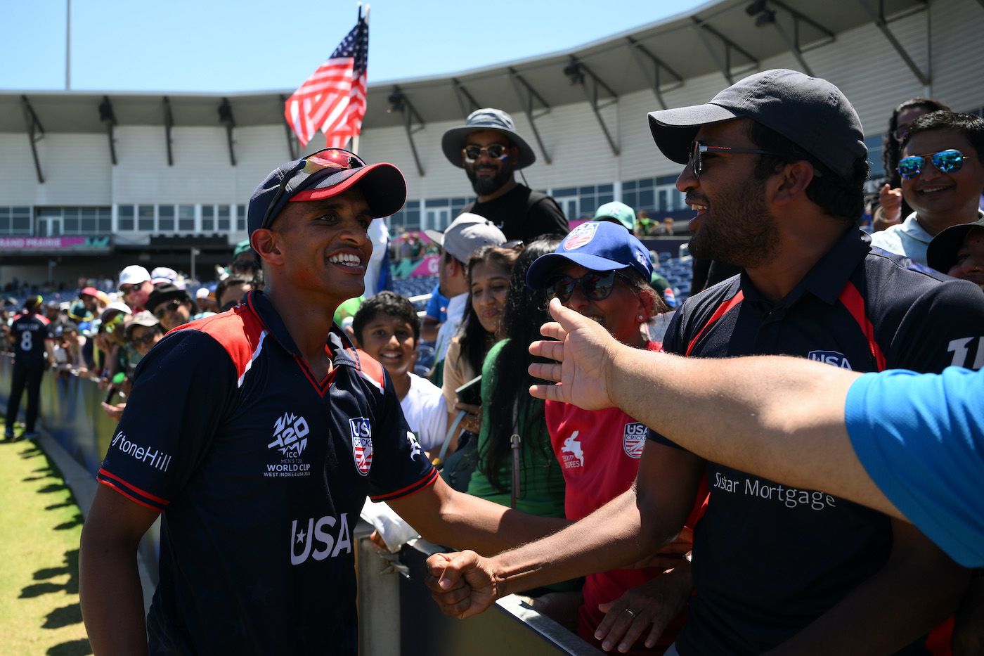 Nosthush Kenjige celebrates USA's win with fans