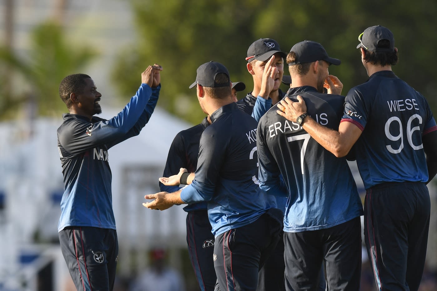 Tangeni Lungameni celebrates the wicket of George Munsey 