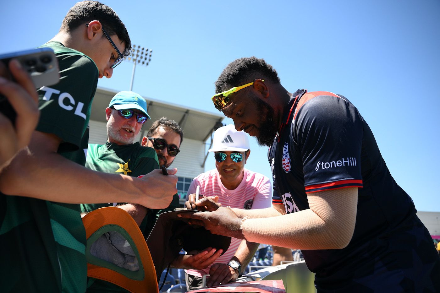 Steven Taylor signs an autograph for Pakistan fans