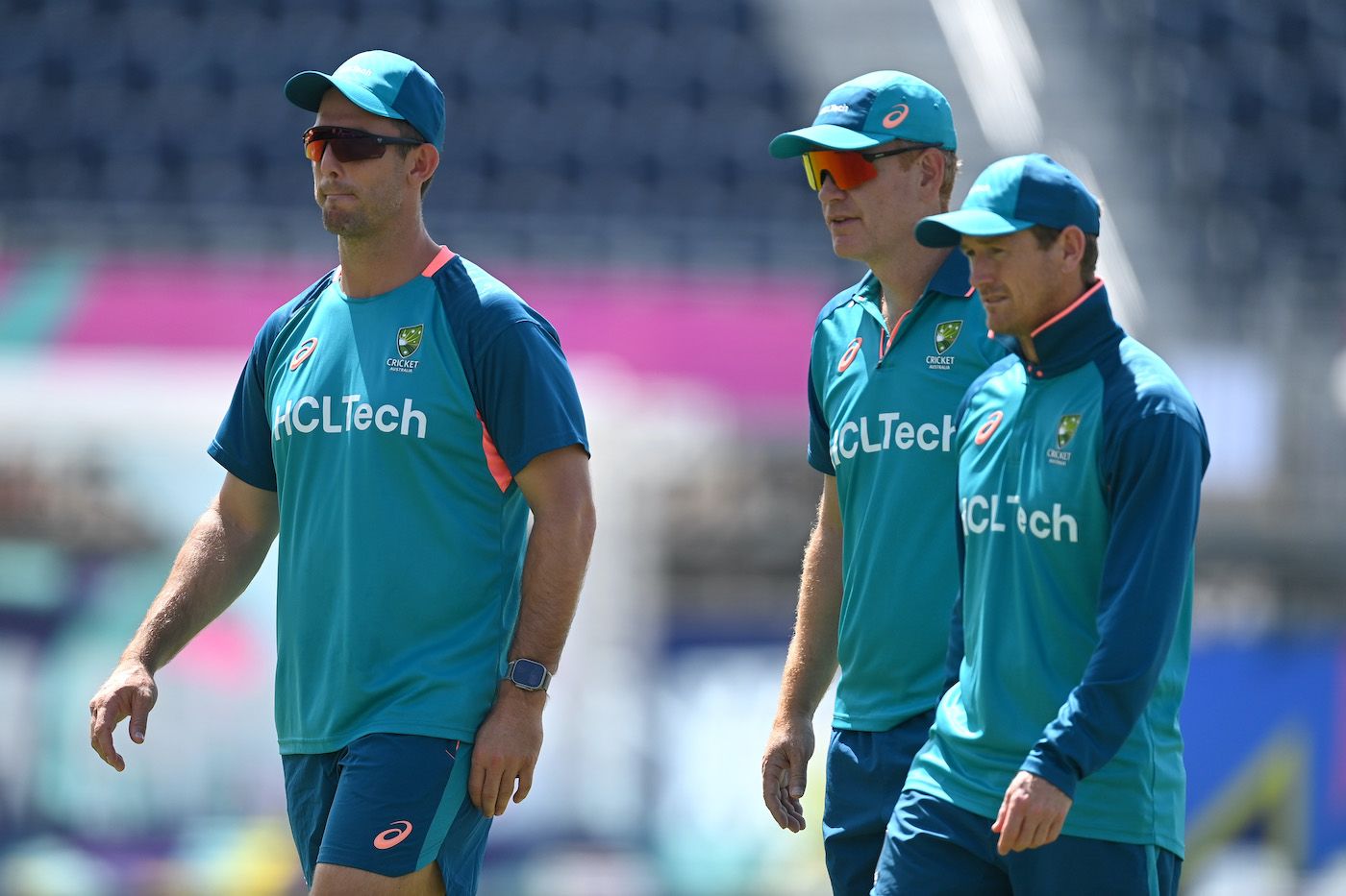 Mitchell Marsh, Andrew McDonald and George Bailey look on during training