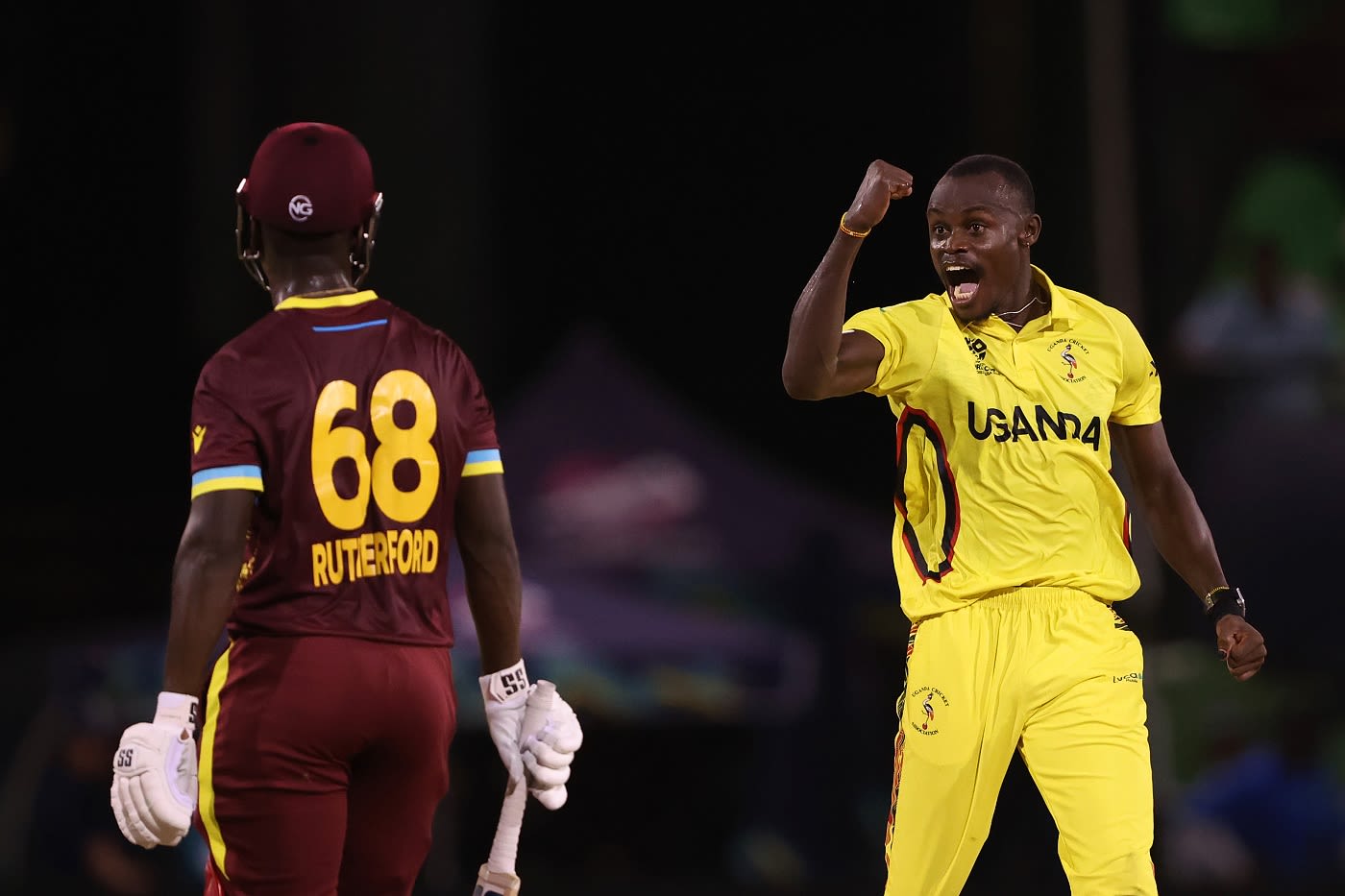 Cosmas Kyewuta gave Sherfane Rutherford a send-off after bowling the perfect yorker