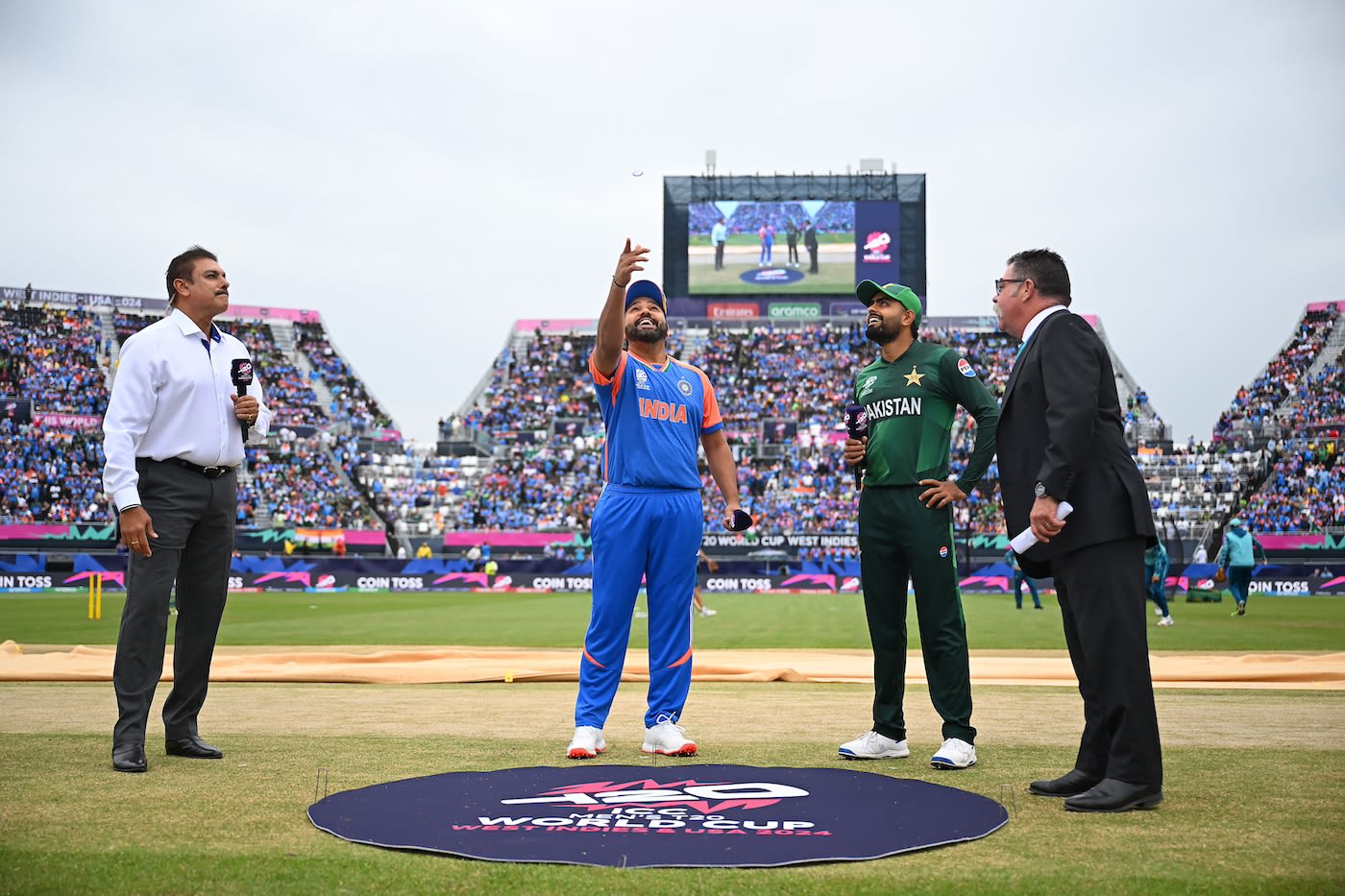 It's nice and relaxed as Rohit Sharma flips the coin and Babar Azam calls