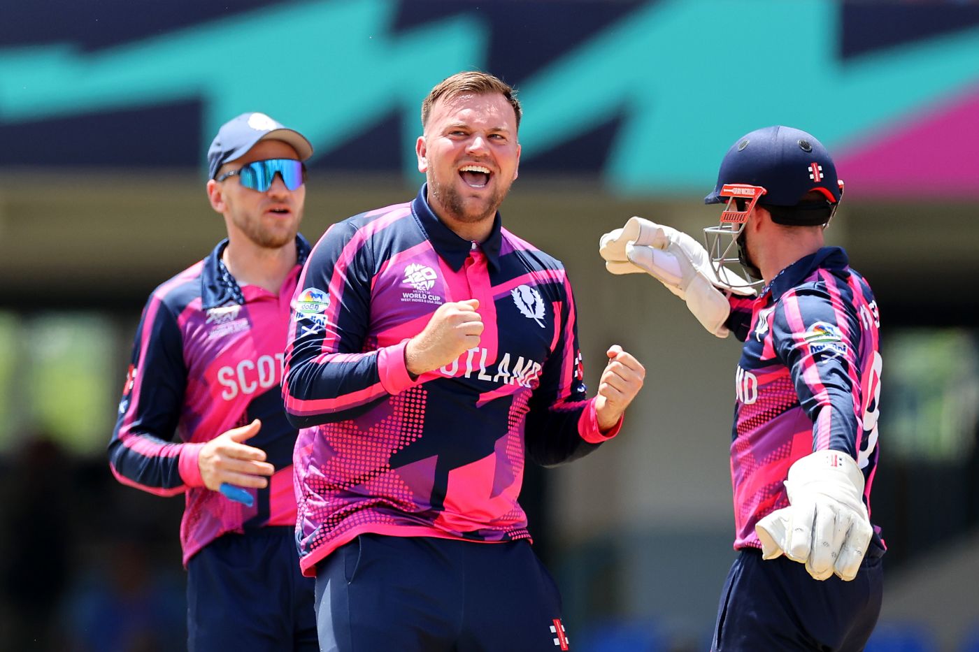 Mark Watt celebrates the wicket of Zeeshan Maqsood