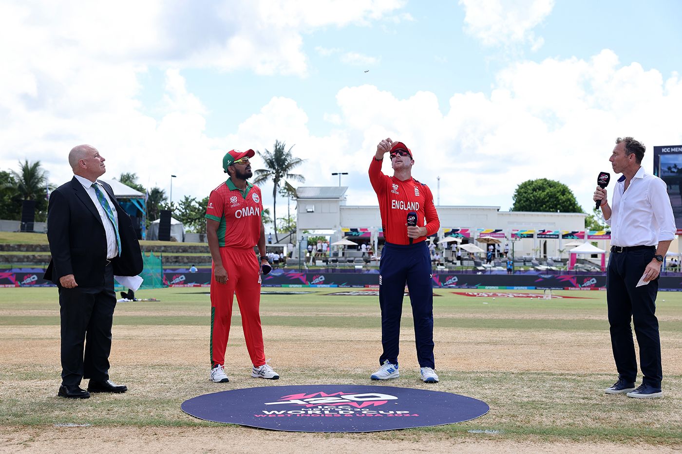 Jos Buttler tosses the coin while Aqib Ilyas looks on