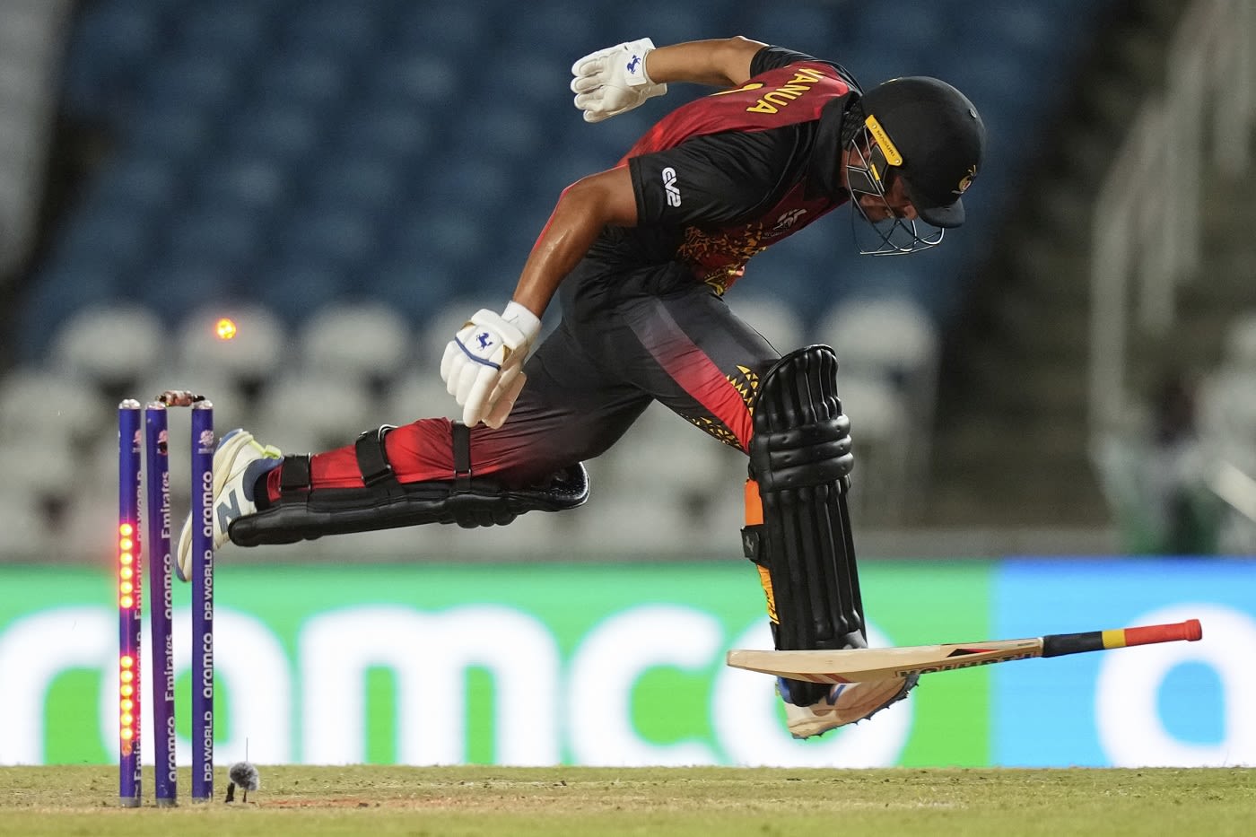 Papua New Guinea lost four wickets, including Norman Vanua, to run-out