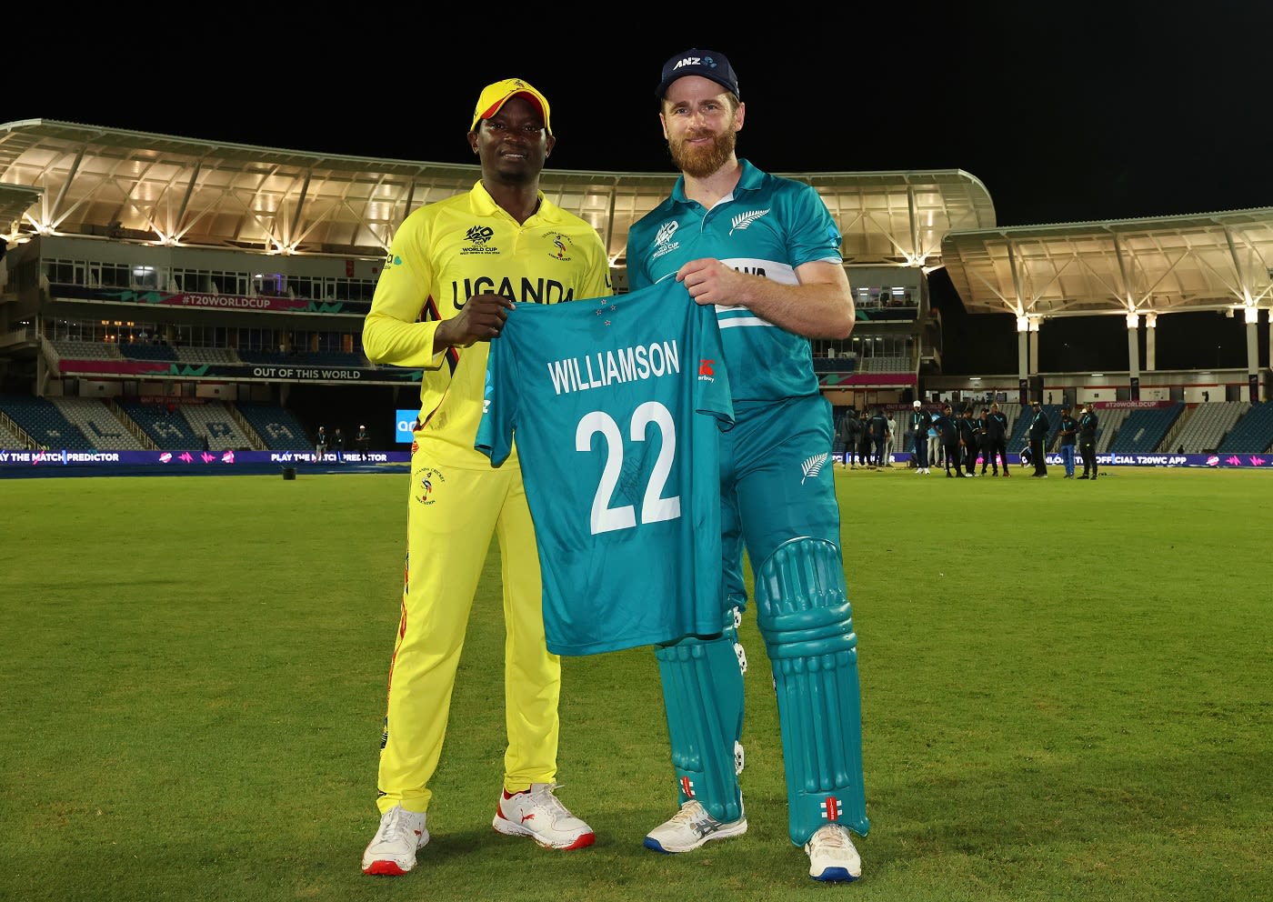 Kane Williamson presents Brian Masaba with a special jersey