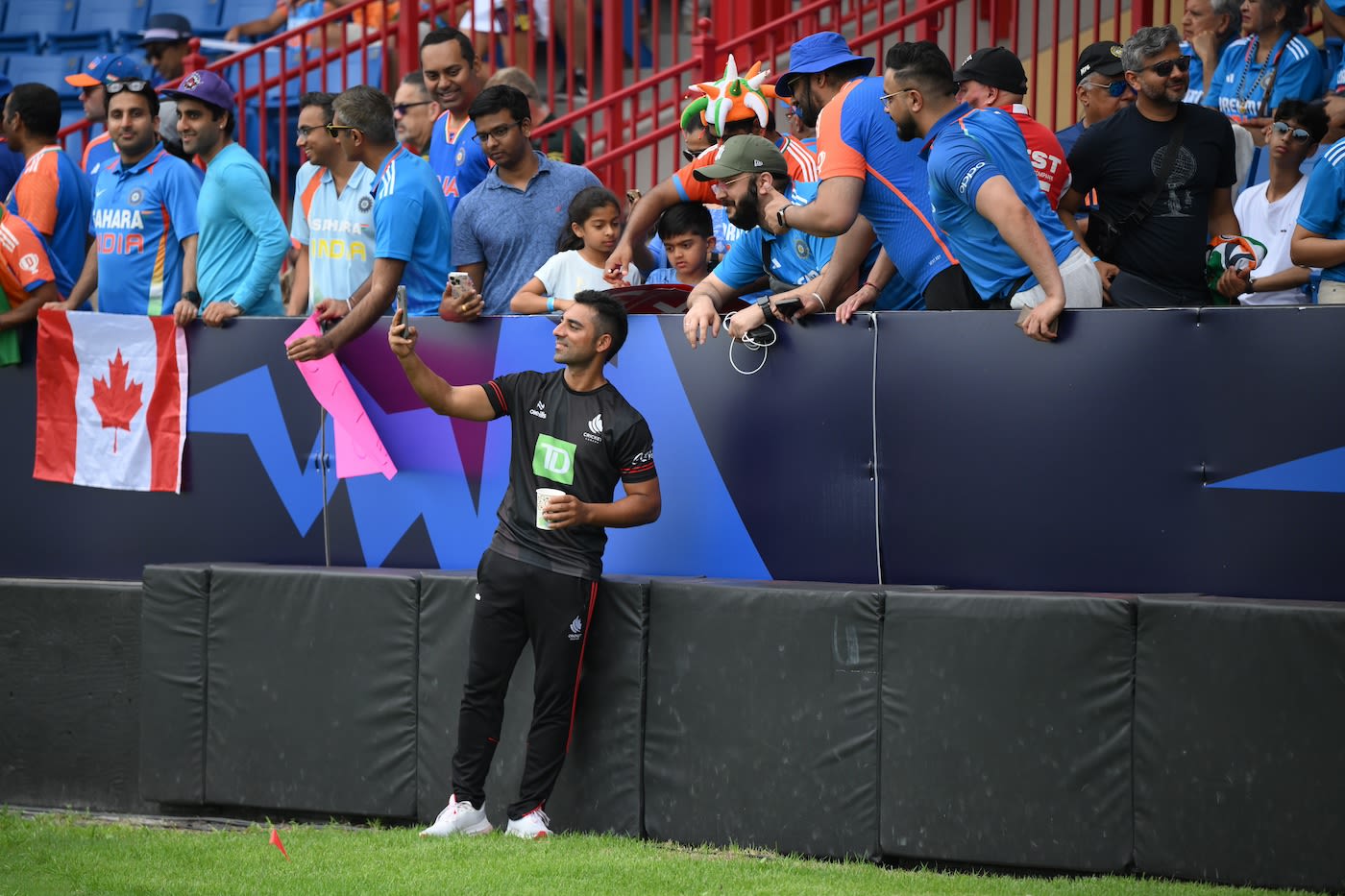 Saad Bin Zafar takes a photograph to remember the World Cup by