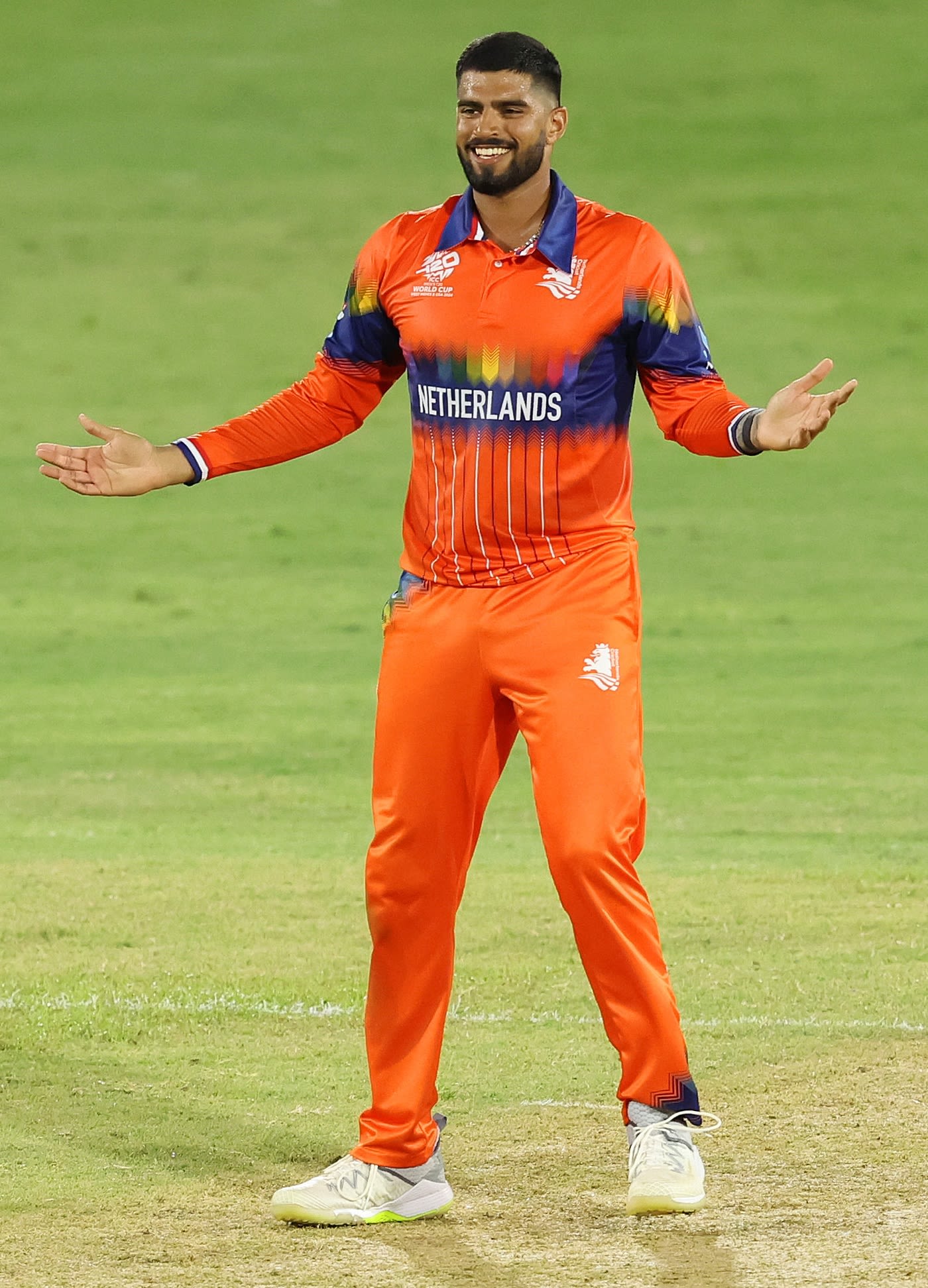 Aryan Dutt celebrates the dismissal of Kusal Mendis