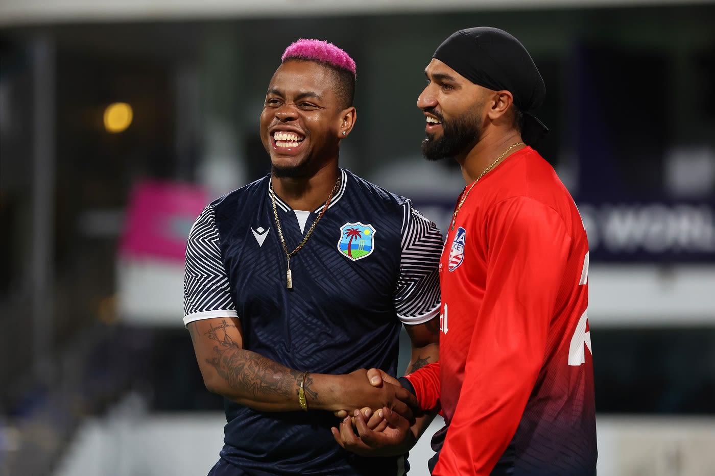 Shimron Hetmyer chats with Jasdeep Singh before the game