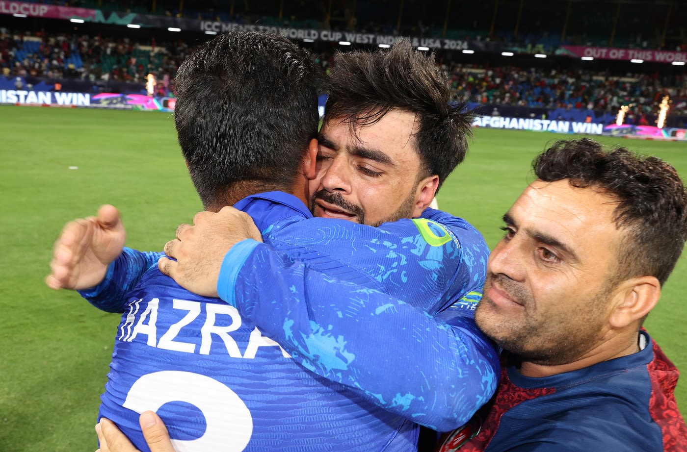Rashid Khan and Hazratullah Zazai are jubilant after Afghanistan's win over Bangladesh