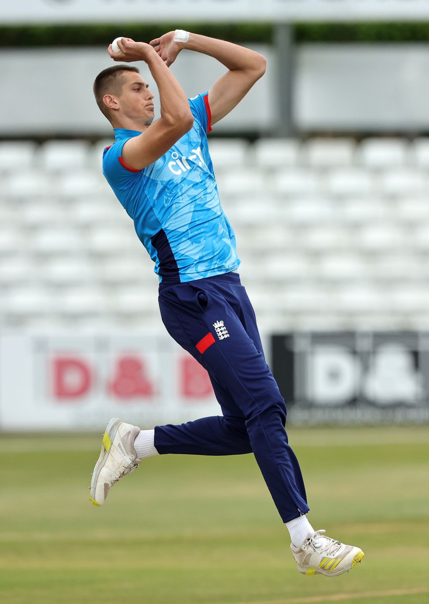 Harry Moore runs in to bowl on Under-19 debut