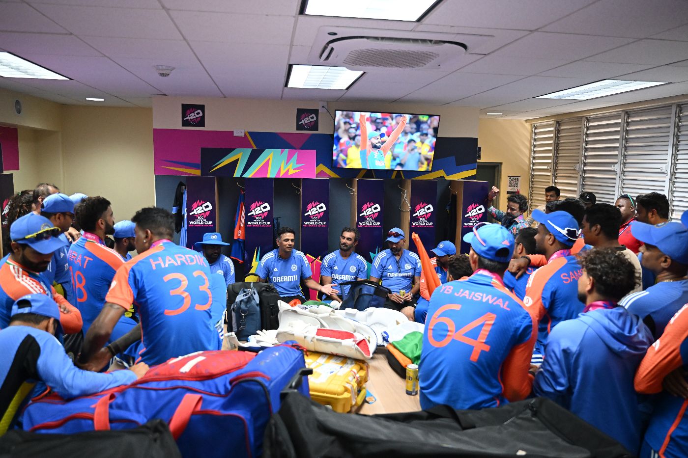 Rahul Dravid gets his team together in the dressing room one last time as India coach