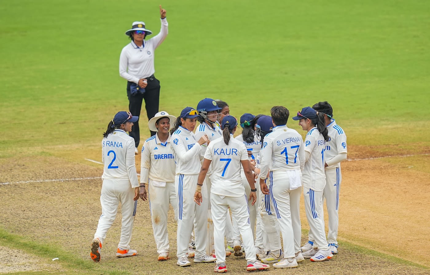 The Indian team celebrate after seeing the back of Laura Wolvaardt