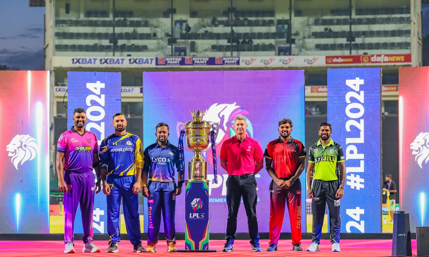 Thisara Perera, Mohammad Nabi, Charith Asalanka, Michael Clarke, Wanindu Hasaranga and Niroshan Dickwella pose during the opening ceremony of LPL 2024