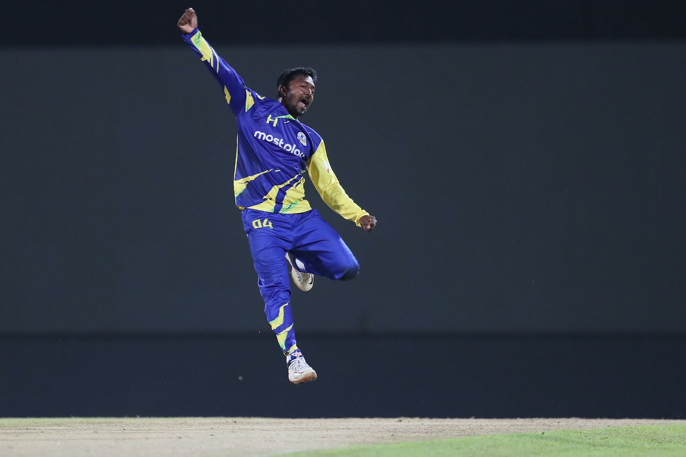 Akila Dananjaya flies after striking off his last ball