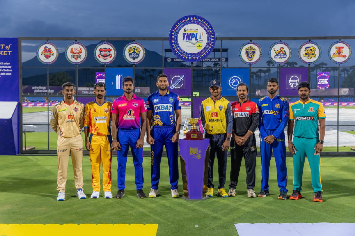B Indrajith, B Aparajith, Vijay Shankar, Shahrukh Khan, KB Arun Karthik, Shijit Chandran, C Hari Nishaanth and Antony Dhas pose with the TNPL trophy