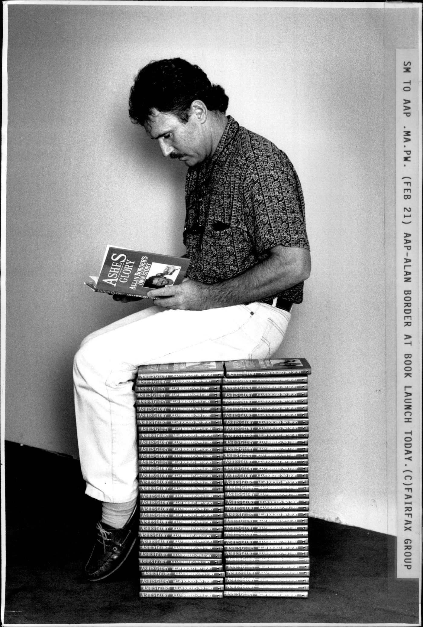 Allan Border reads his own book at his book launch