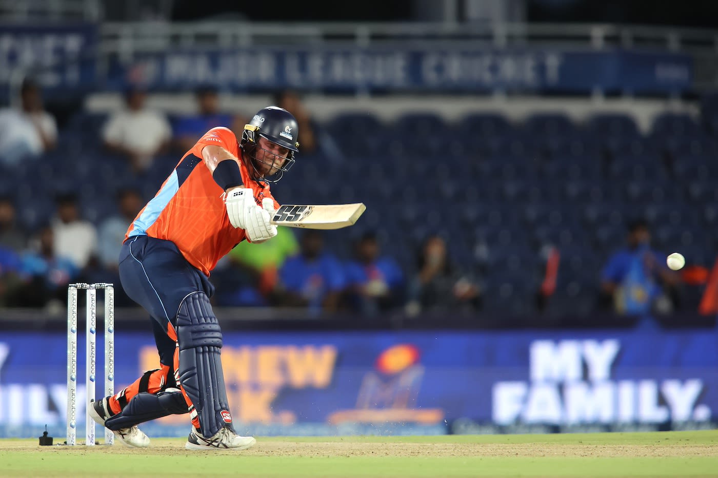 Corey Anderson drills the ball down the ground