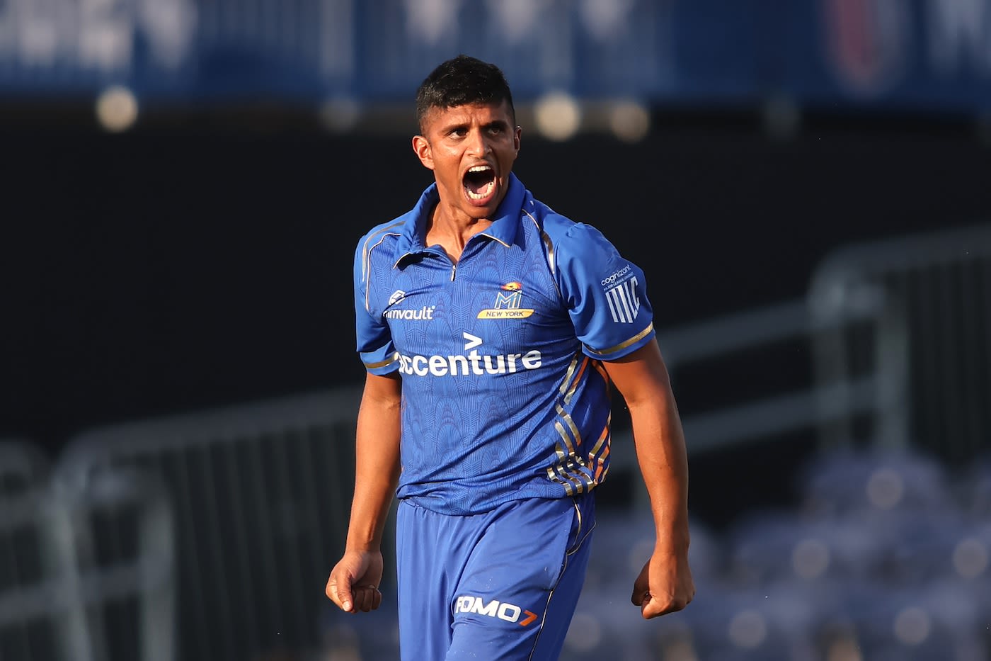Nosthush Kenjige celebrates a wicket