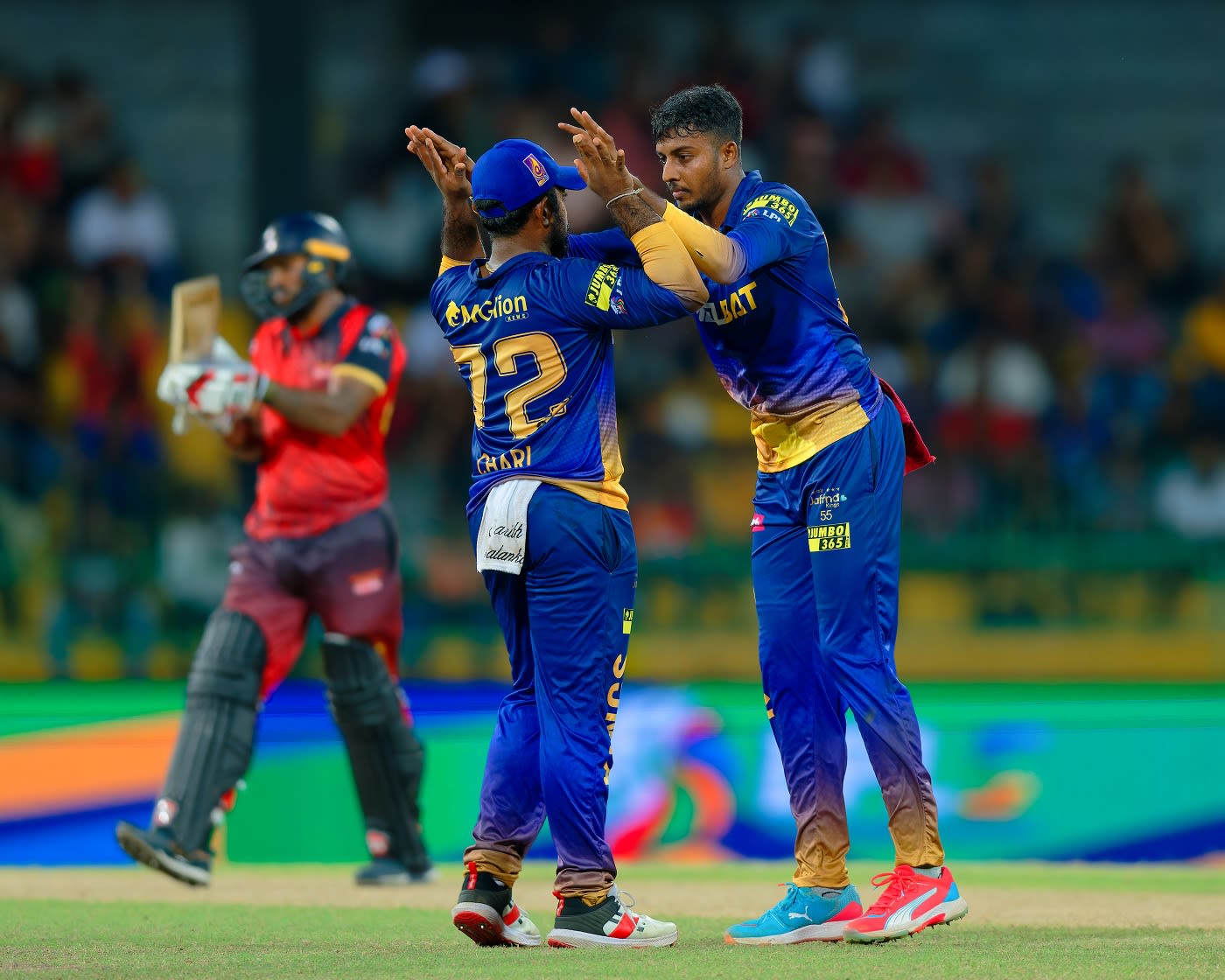Vijayakanth Viyaskanth celebrates a wicket with his captain Charith Asalanka