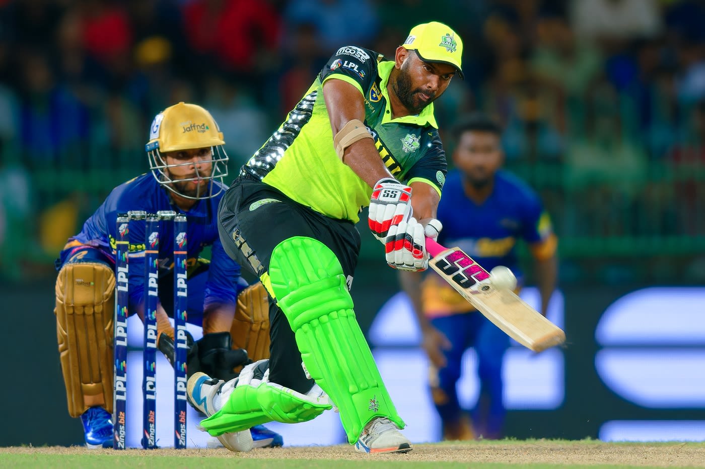 Bhanuka Rajapaksa winds up for a big hit