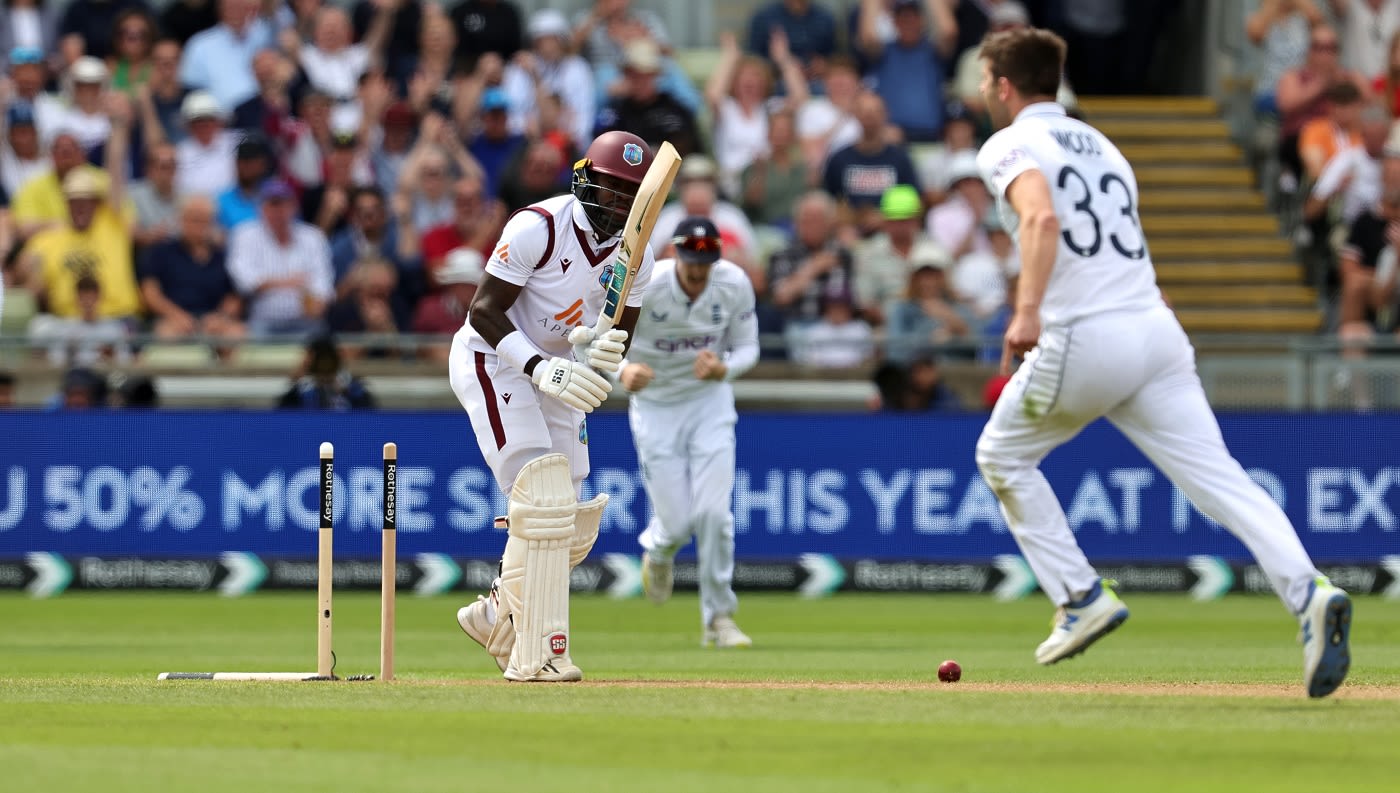 Mark Wood wheels away after flattening Kirk McKenzie's middle pole