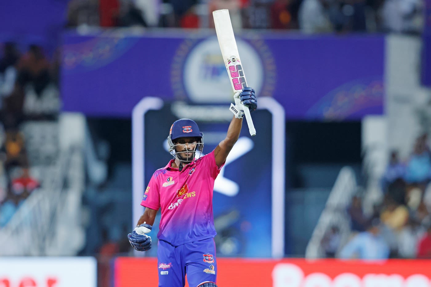 Amit Sathvik celebrates after bringing up his half-century