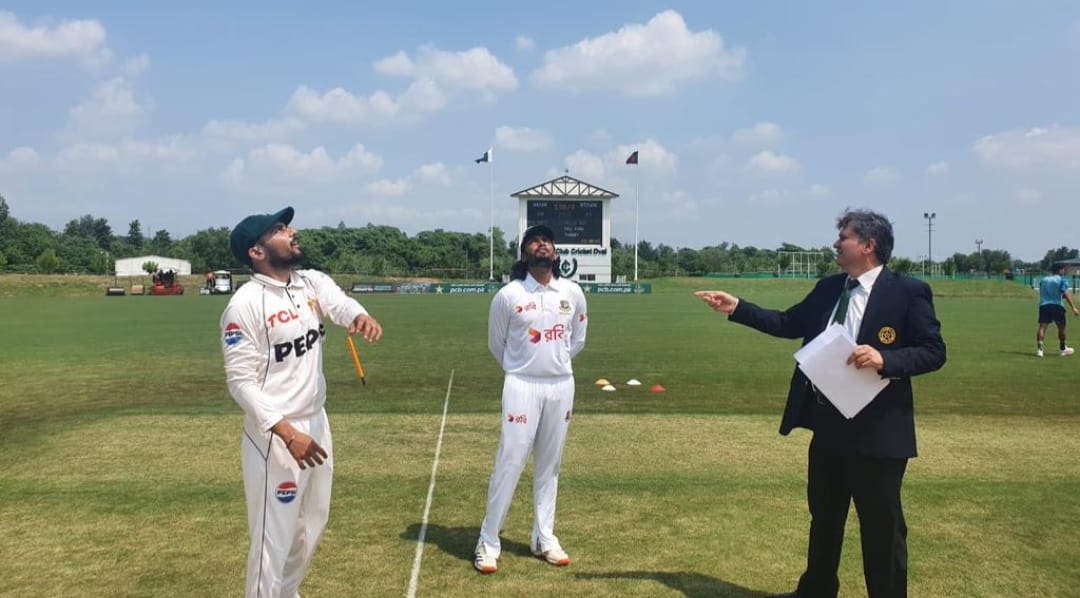 Saud Shakeel and Anamul Haque at the toss